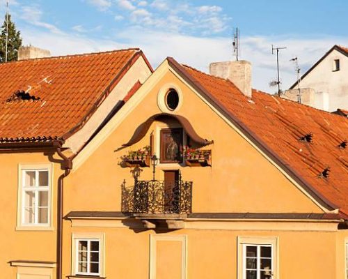 Facades of buildings built in the last century in Prague
